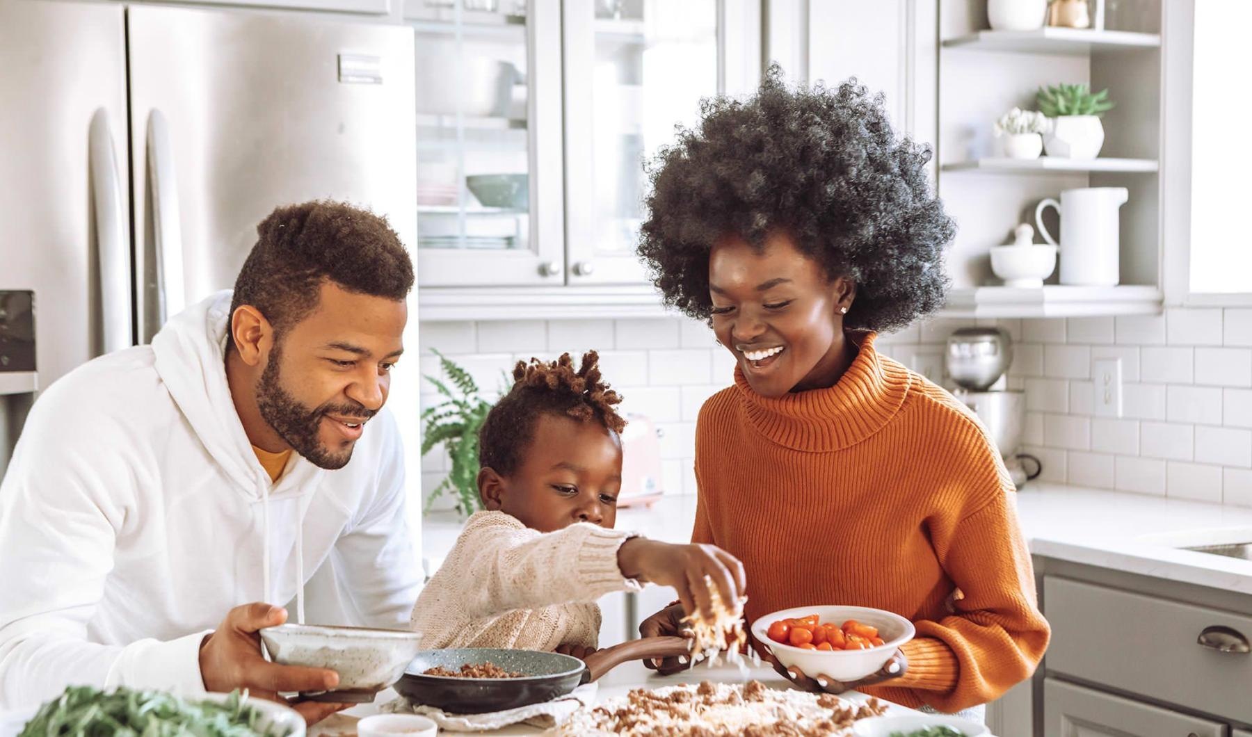 a family cooking together