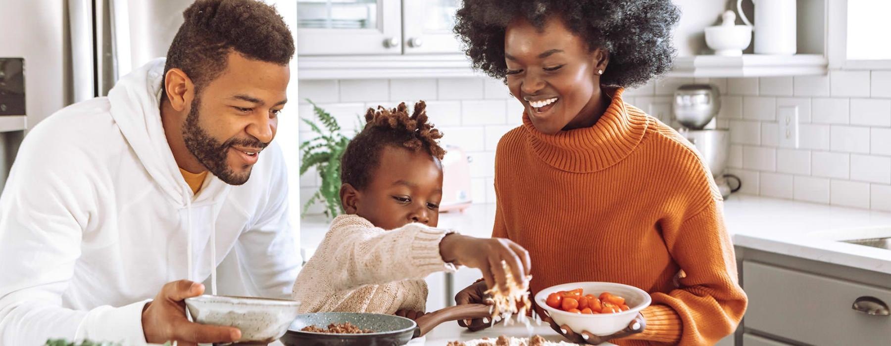 a family cooking together